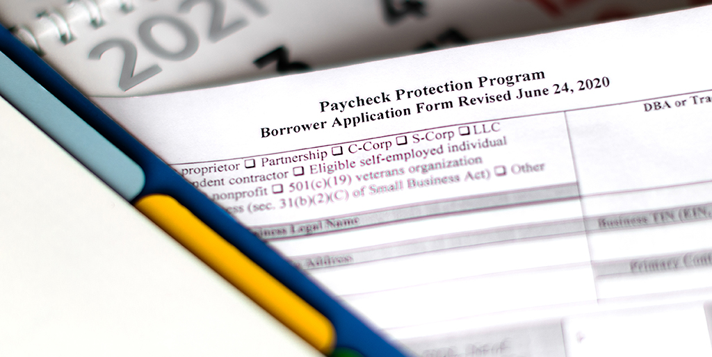 A closeup of Paycheck Protection Program application paperwork.
